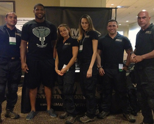 ARM pose with vegan NFL lineman, David Carter.